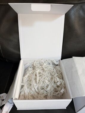 White Gift Box with Branded Shredded Paper Filler